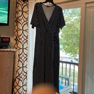 And harmony navy blue polkadot, V-neck surplice look dress. Size 1x worn once.